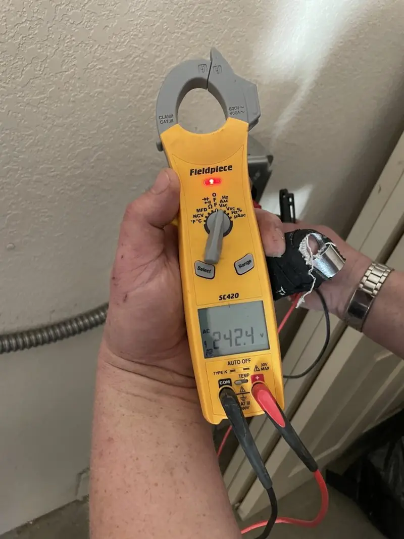 Voltage testing with clamp meter during Circuit Breaker Repair in Mocksville